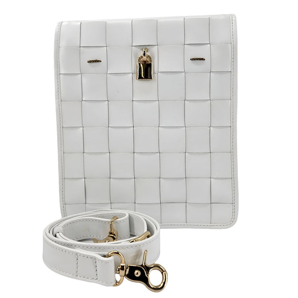 White woven handbag with gold accents on a white background