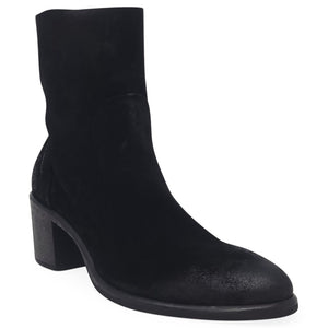 Black ankle boot on a white background