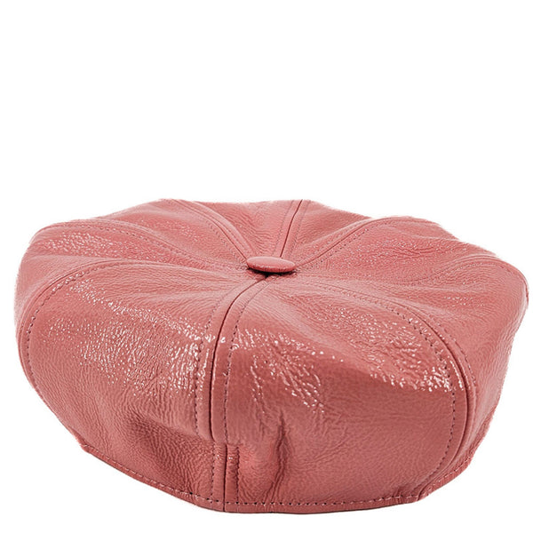 Pink textured beret on a white background
