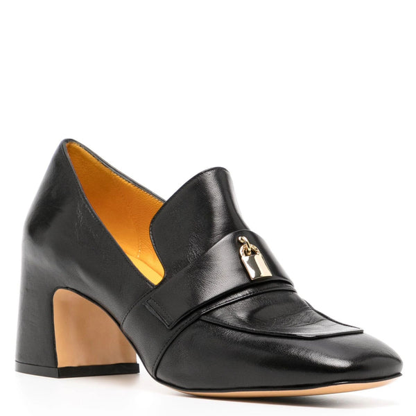 Black leather shoe with a gold buckle on a white background
