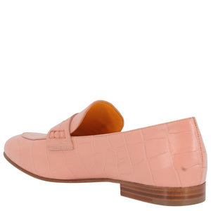 Pink loafer shoe on a white background