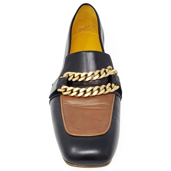 Flat Loafer Blk/Tan featuring buttery-soft leather and flat chain detail for luxe everyday style.
