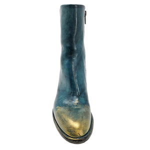 Blue leather boot with gold sole on a white background
