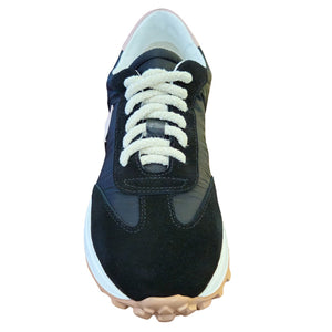 Black and blue sneaker with white laces on a white background