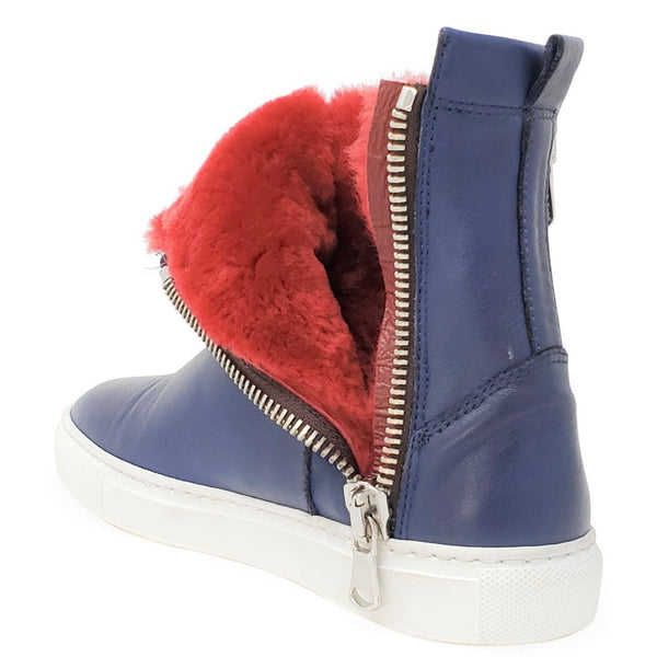 Blue boot with red fur lining and zipper on a white background