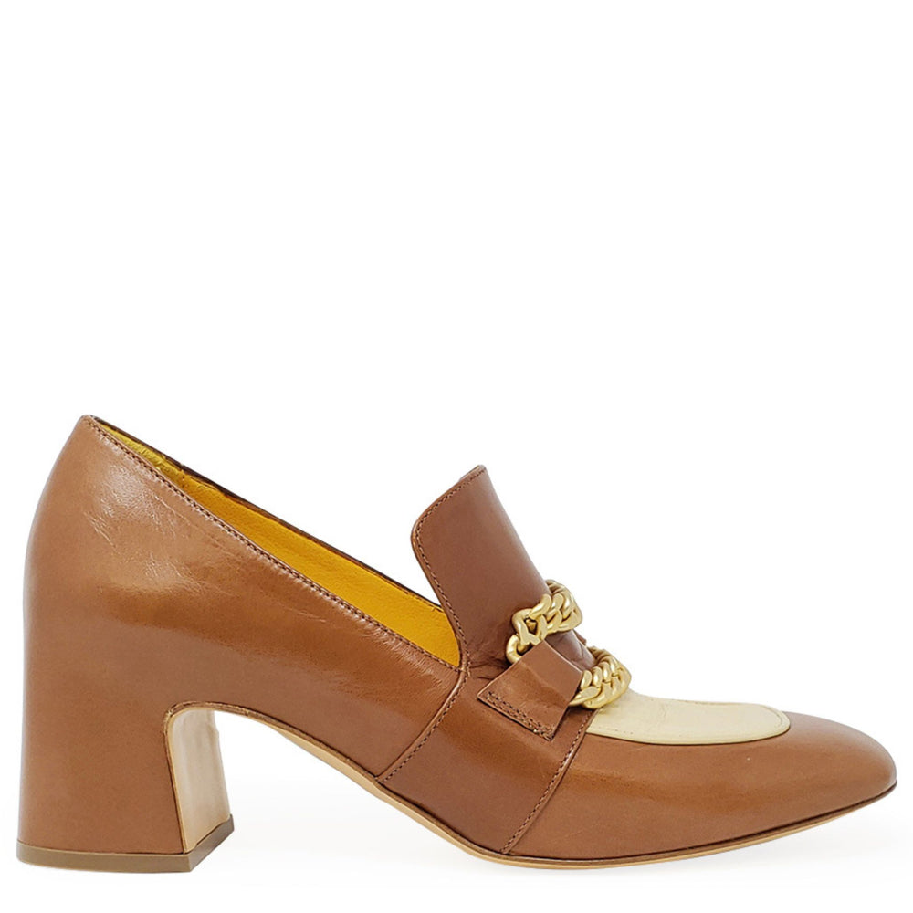 Brown leather shoe with gold chain detail on a white background