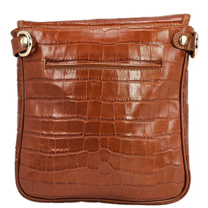 Brown crocodile-patterned handbag with gold zipper and hardware on a white background