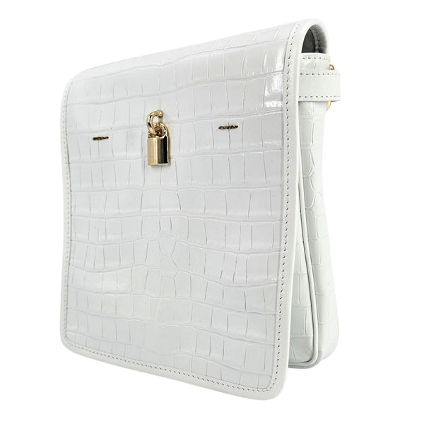 White crocodile-patterned handbag with a gold lock on a white background