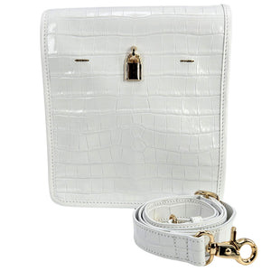 White crocodile-patterned handbag with gold accents on a white background