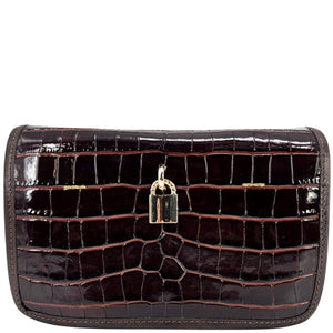 Brown crocodile-patterned clutch bag with a gold lock on a white background