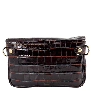 Black crocodile-patterned handbag with gold accents on a white background