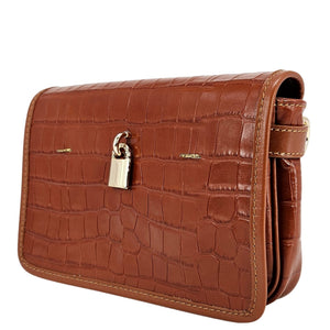 Brown textured handbag with a gold lock on a white background