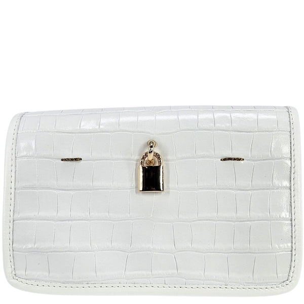 White textured wallet with a gold and black charm on a white background