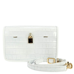 White crocodile-patterned handbag with gold accents on a white background