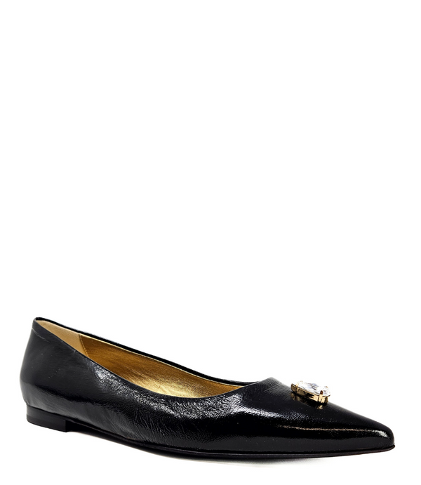Pointed-toe slingback flat featuring a low block heel, textured fabric upper, slim ankle strap with side buckle, and a large jeweled buckle embellishment on the toe