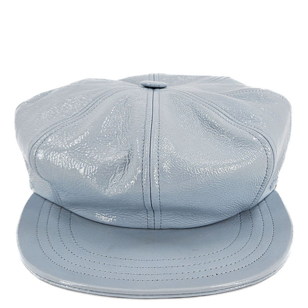 Light blue leather cap on a white background