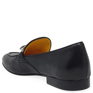 Black loafer shoe with a white background