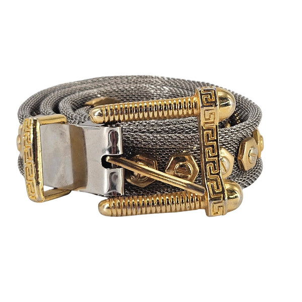 Metallic belt with gold and silver buckle on a white background