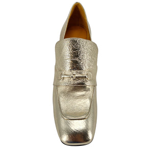 Gold metallic loafer shoe on a white background