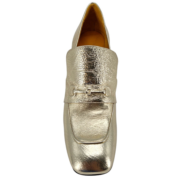 Gold metallic loafer shoe on a white background
