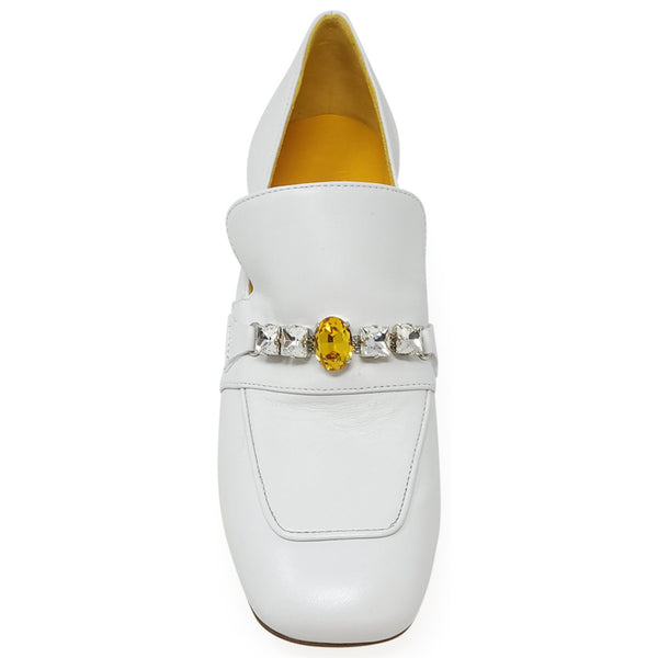 White shoe with a decorative band featuring a yellow gemstone on a white background