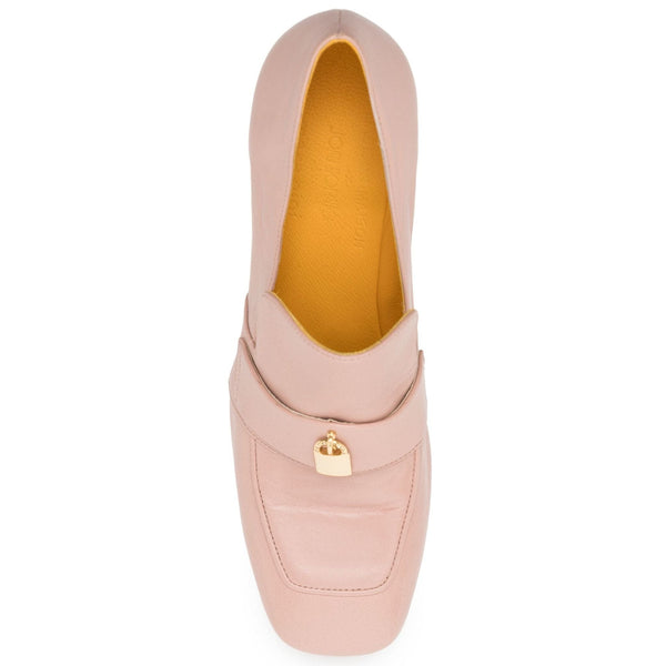 Pink loafer shoe with a gold heart charm on a white background