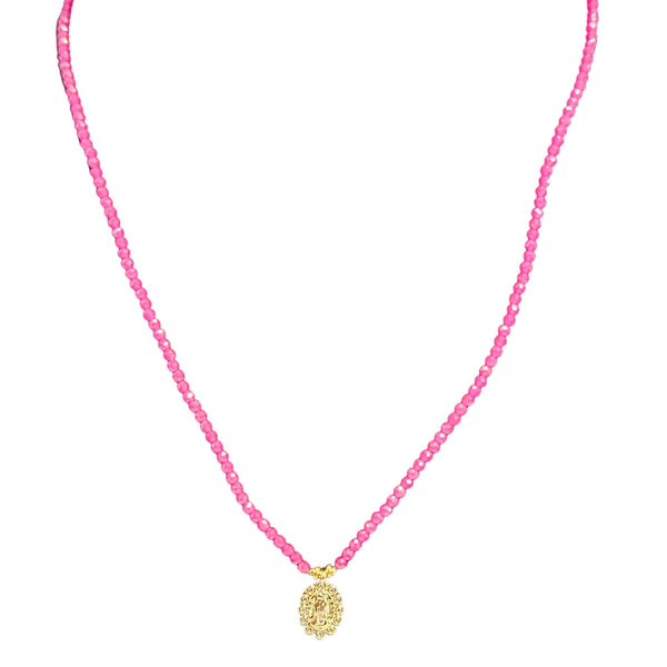 Necklace with pink beads and a gold pendant on a white background