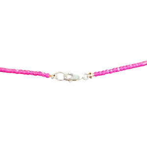 Necklace with pink beads and a silver clasp on a white background