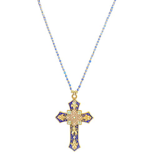 Gold and blue cross pendant necklace on a white background