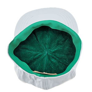 White and green pet bed on a white background