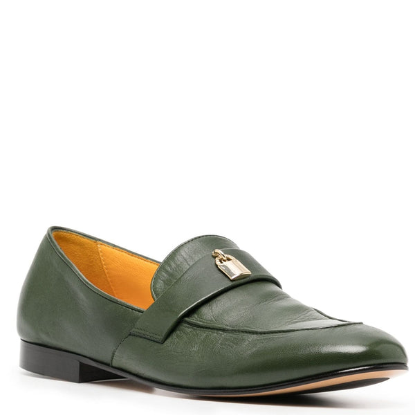 Green leather loafer with a gold buckle on a white background