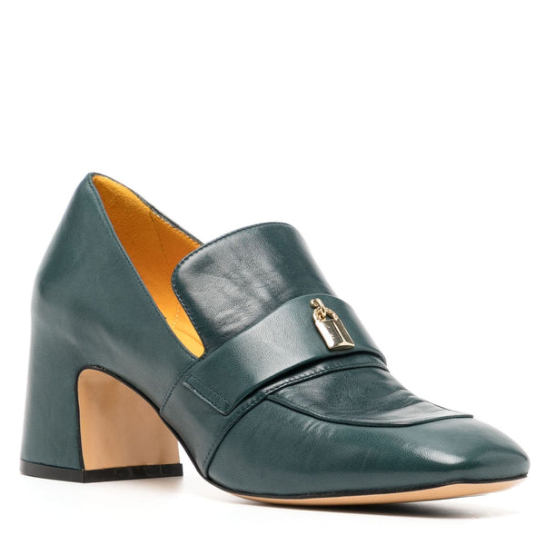 Green leather shoe with a gold buckle on a white background