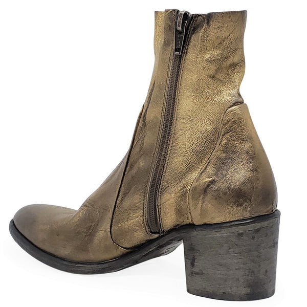 Gold leather boot with a zipper on a white background
