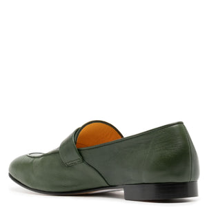Green leather loafer shoe on a white background