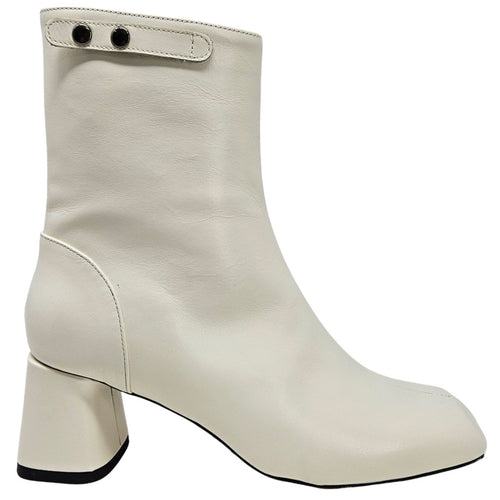 White ankle boot with block heel on a white background