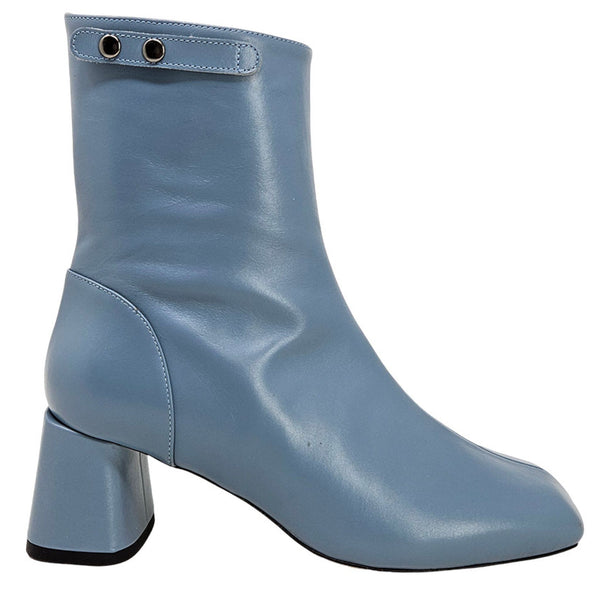 Blue ankle boot with a block heel on a white background