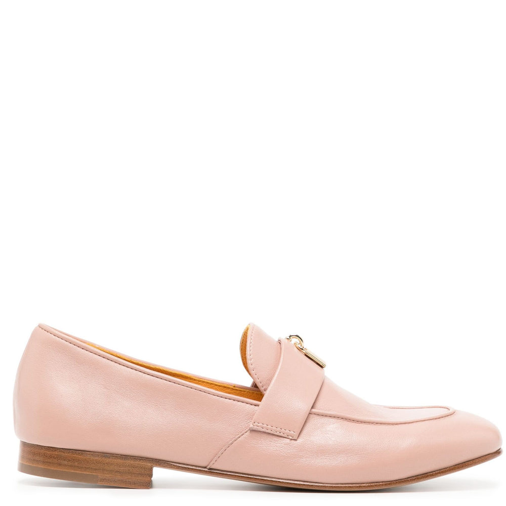 Pink loafer shoe on a white background