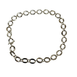Silver chain bracelet on a white background