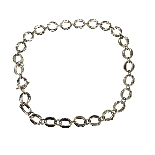 Silver chain bracelet on a white background