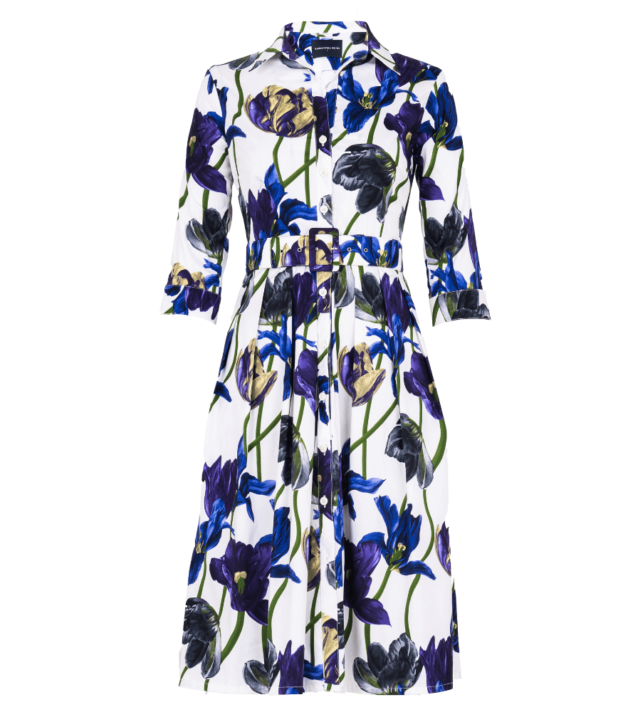 A knee-length dress with a collared neckline, three-quarter sleeves, and a flared skirt. Features a bold allover abstract pattern and fitted waist.