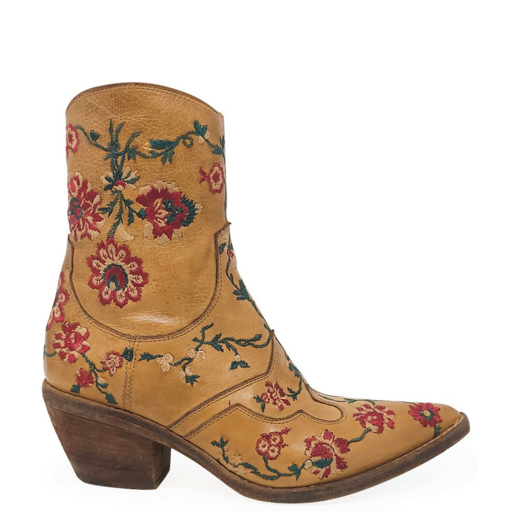 Tan cowboy boot with floral embroidery on a white background