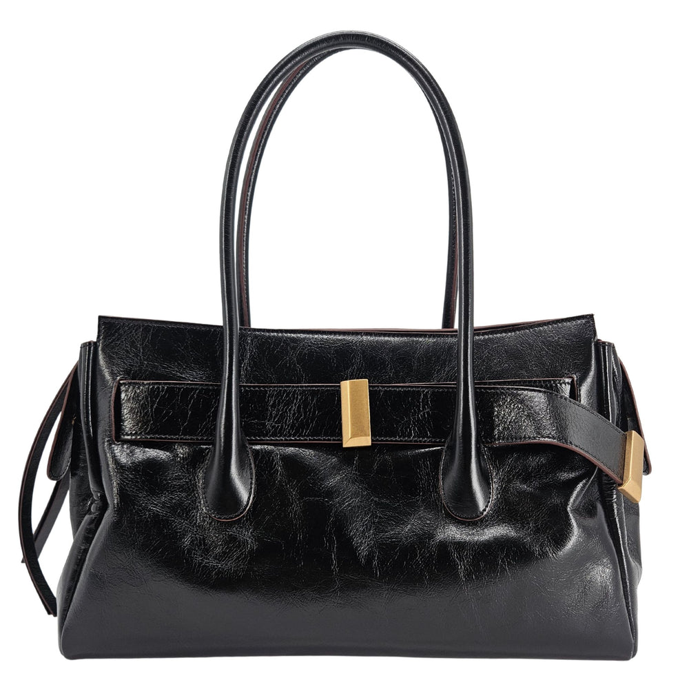 A sleek, black leather handbag with two slender top handles and a horizontal gold bar accent on the front.