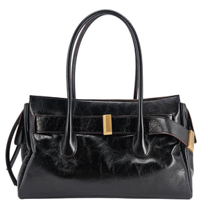 A sleek, black leather handbag with two slender top handles and a horizontal gold bar accent on the front.