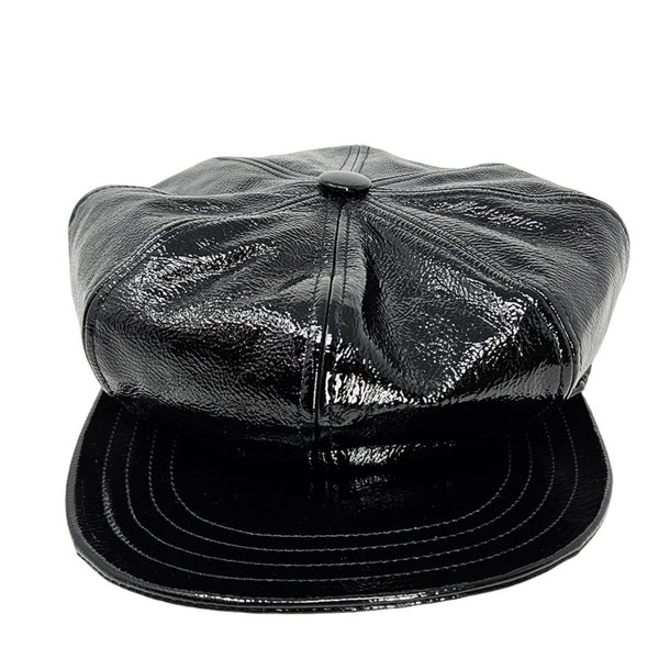 Black leather cap on a white background