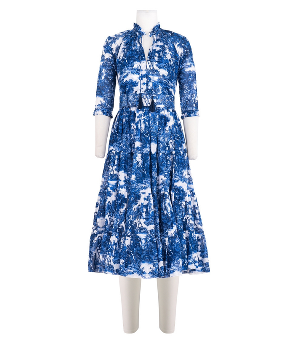 A knee-length dress with a collared neckline, three-quarter sleeves, and a flared skirt. Features a bold allover abstract pattern and fitted waist.