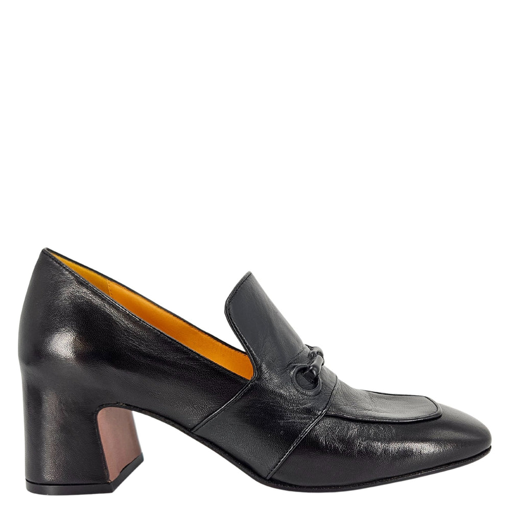 Black leather shoe with a block heel on a white background