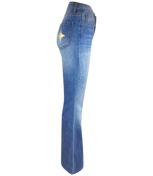Flared-leg pants made in Italy with a mid-rise fit, featuring front and back pockets and star-shaped accents on the hip, lower leg, and back pocket. Displayed from multiple angles against a clean background