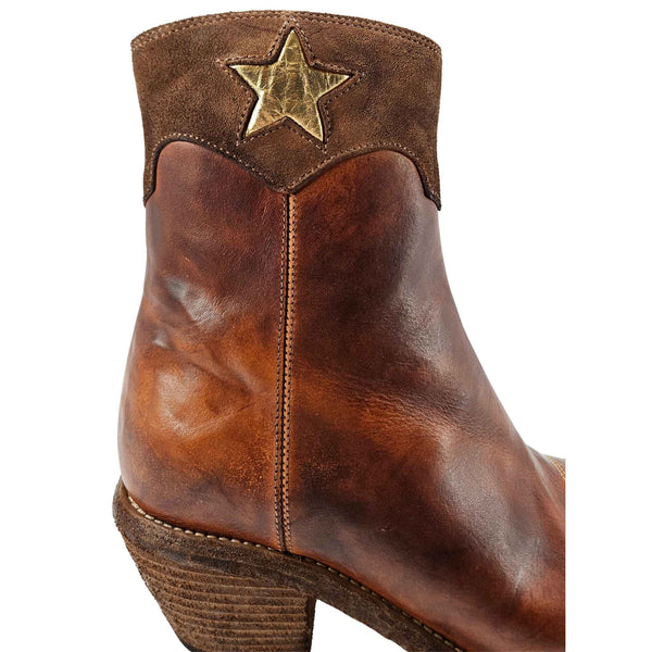 Cognac leather cowboy ankle boots, gold star emblem on shaft, pointed toe, low heel