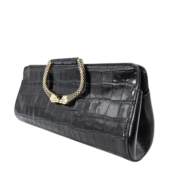 Black crocodile-patterned handbag with gold chain handle on a white background