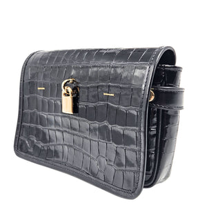 Black crocodile-patterned handbag with gold clasp on a white background